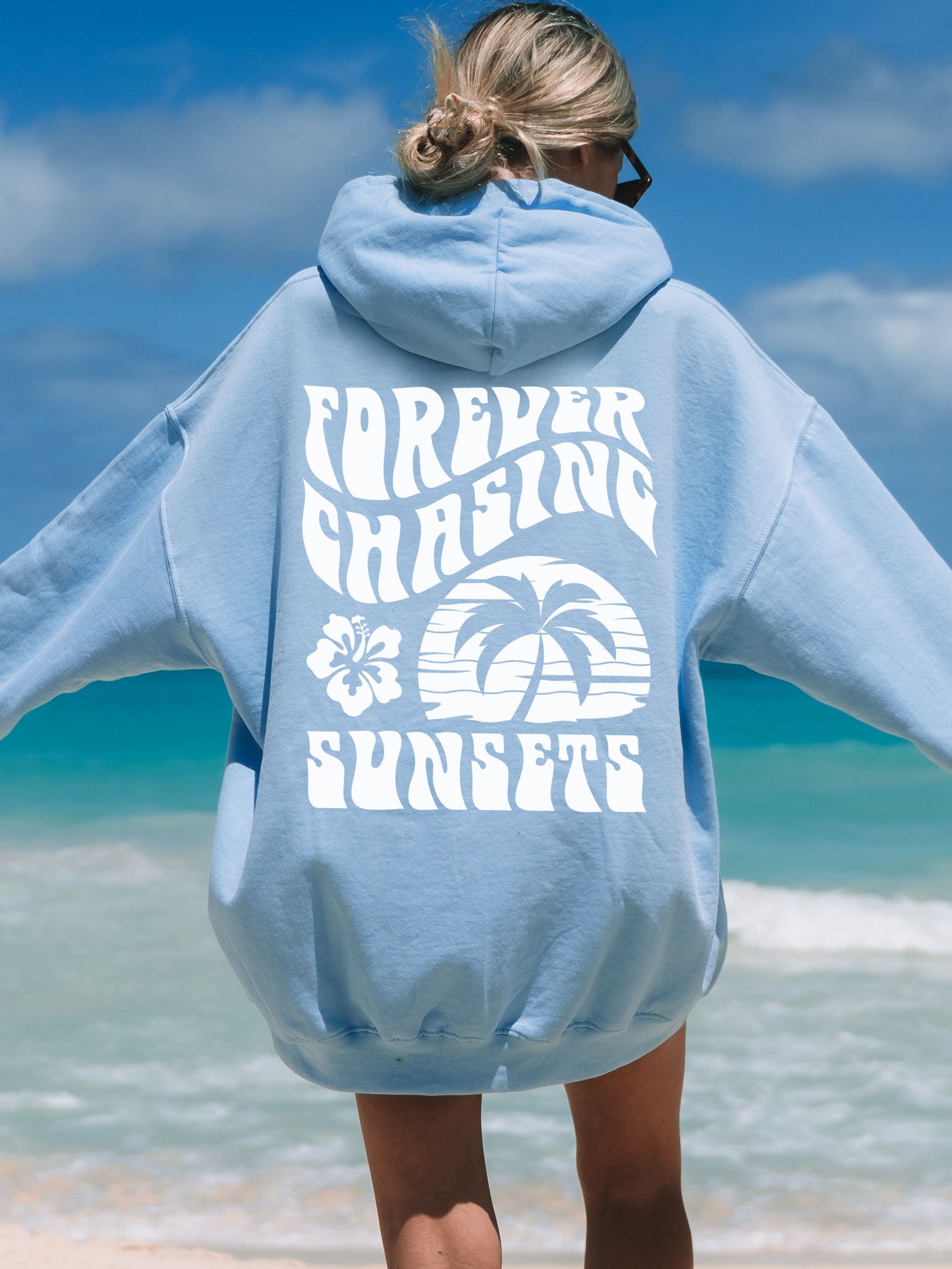 Forever Chasing Sunsets Hoodie Light Blue with White Ink